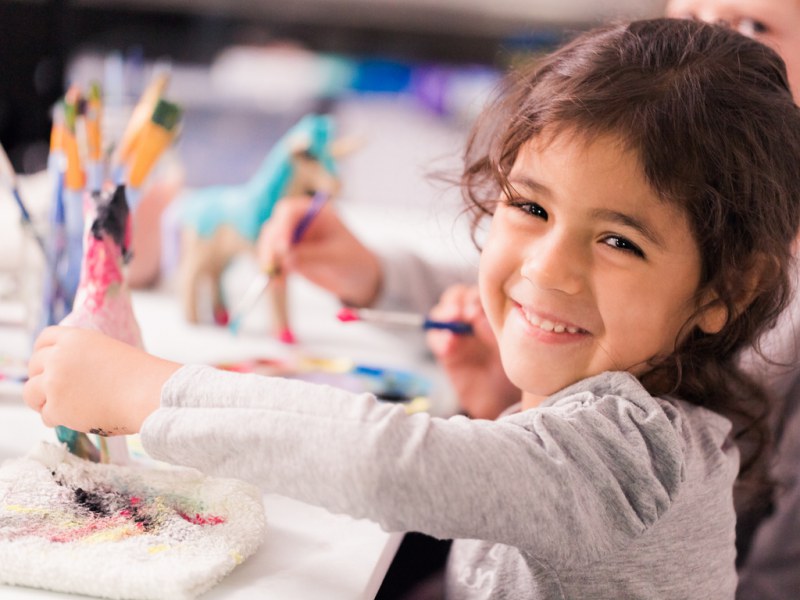 young girl doing at home math activities